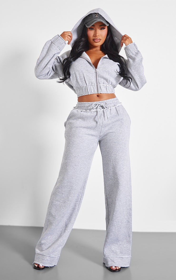 https://cdn-img.prettylittlething.com/e/9/3/6/e936e32a083c78cd29438eae19716785c0fb4f14_CNK5745_3_shape_grey_marl_distressed_elasticated_waistband_cropped_hoodie.jpg