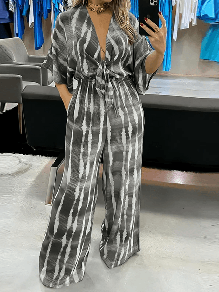 V-neck lace-up print loose jumpsuit
 HW5C6QMUBY - Bona Fide Fashion